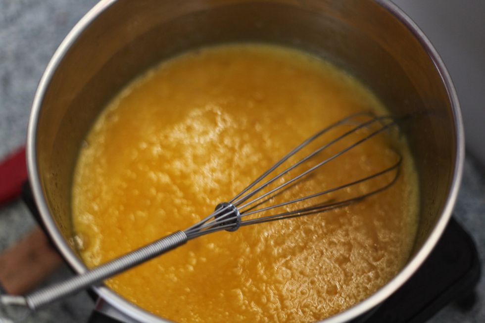 Stir in your 2 tablespoons of vanilla essence and turn off the heat. We want this to go to room temperature.