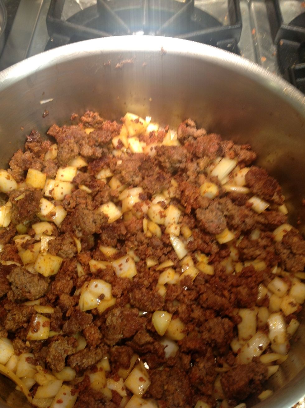 stir into browned beef & chorizo and cook until soft & translucent.