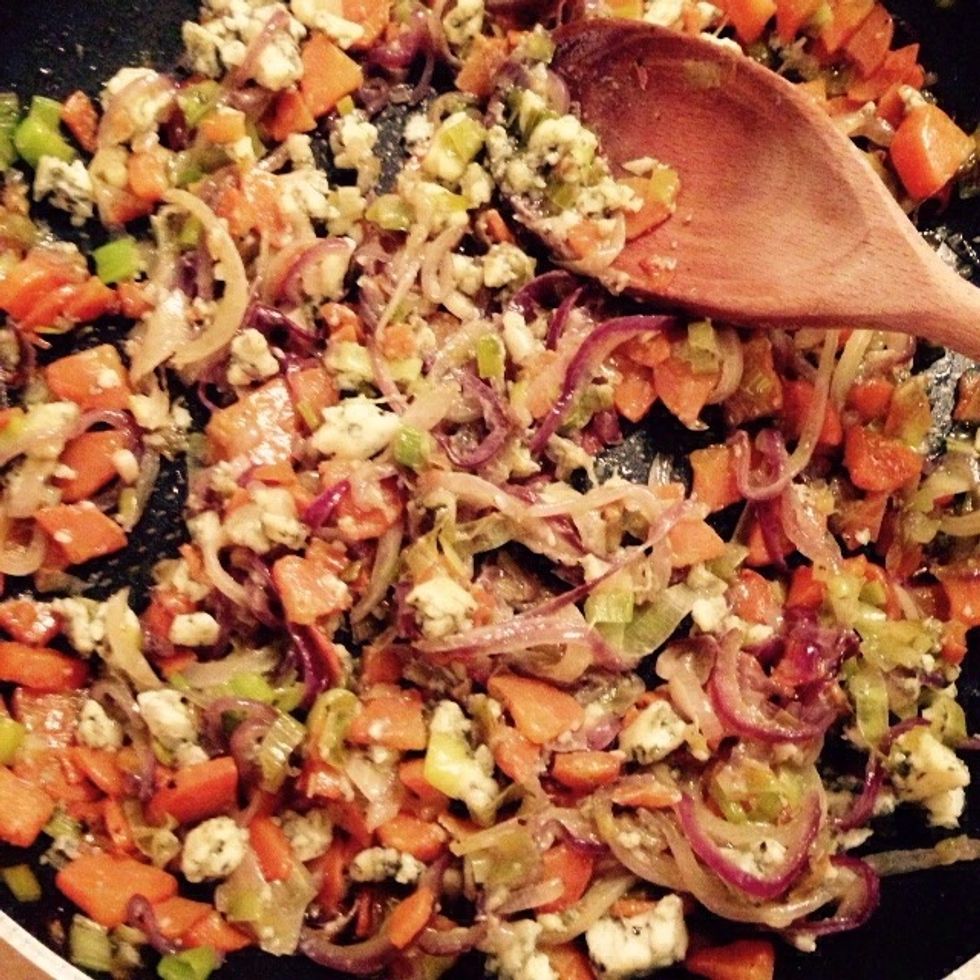 Stir it in the onions mix when cold, so that it won't melt