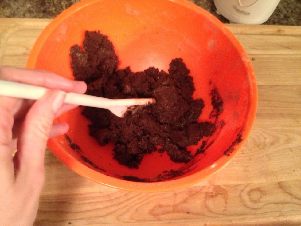 Stir it with a spoon until it gradually comes together in small clusters.