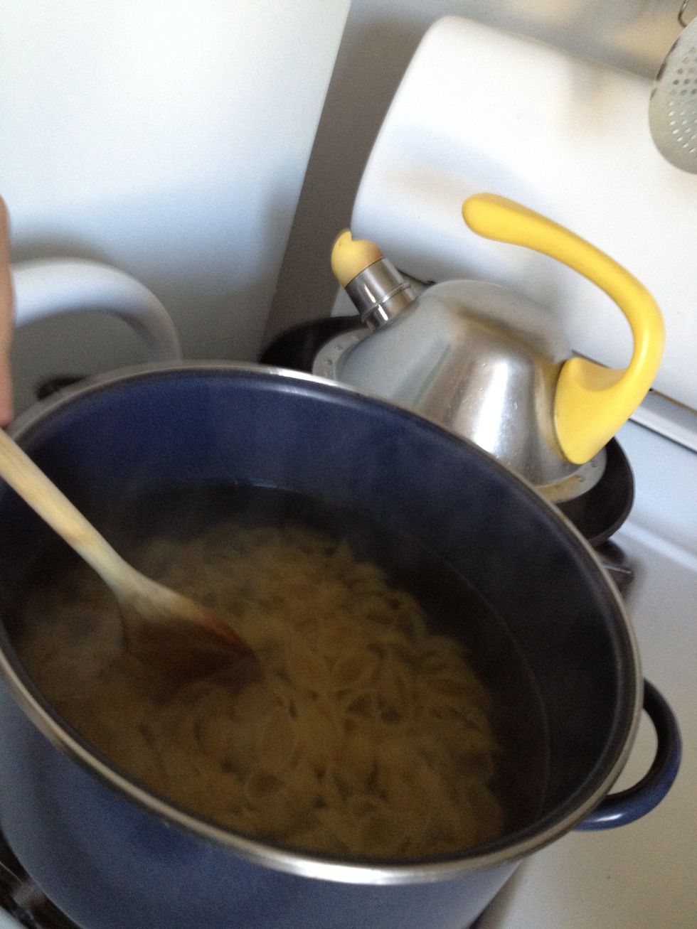 Stir pasta.