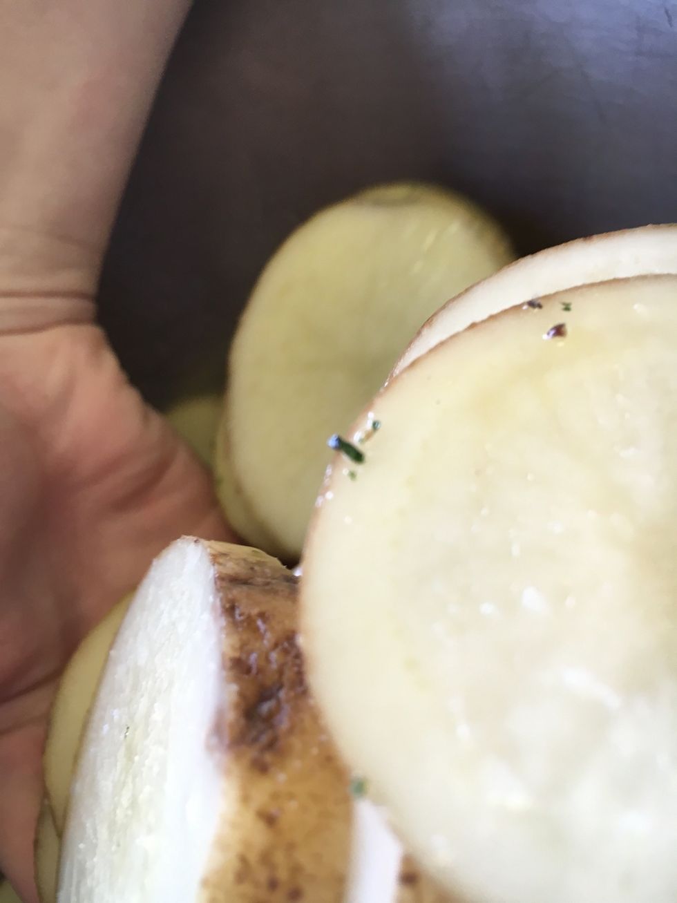 Stir potatoes with hands