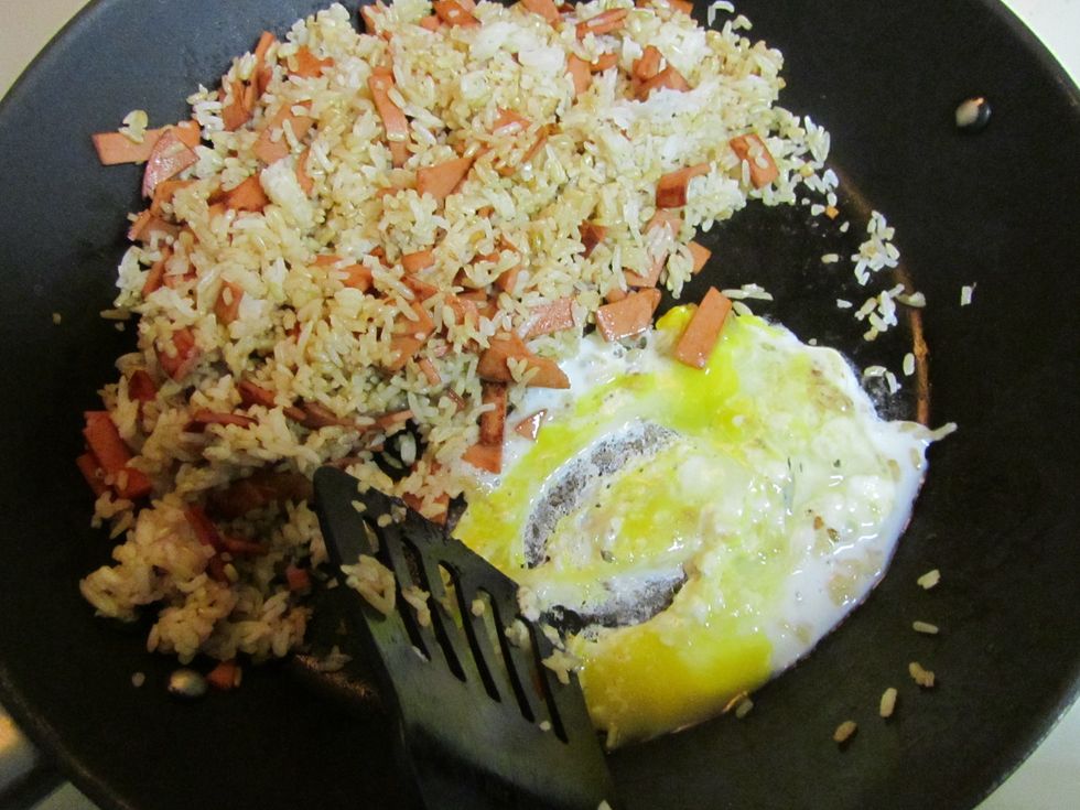 Stir quickly to make scramble egg.