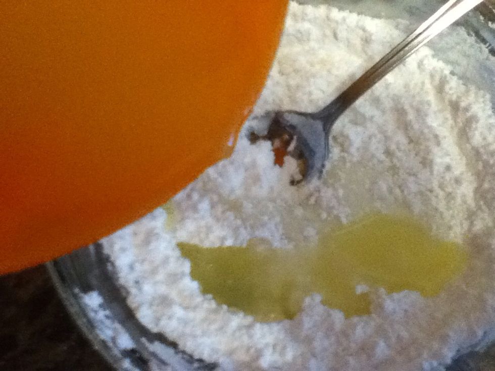 Stir remaining lemon juice a teaspoon at a time into powdered sugar until thick glaze is achieved. You probably won't need all of it.