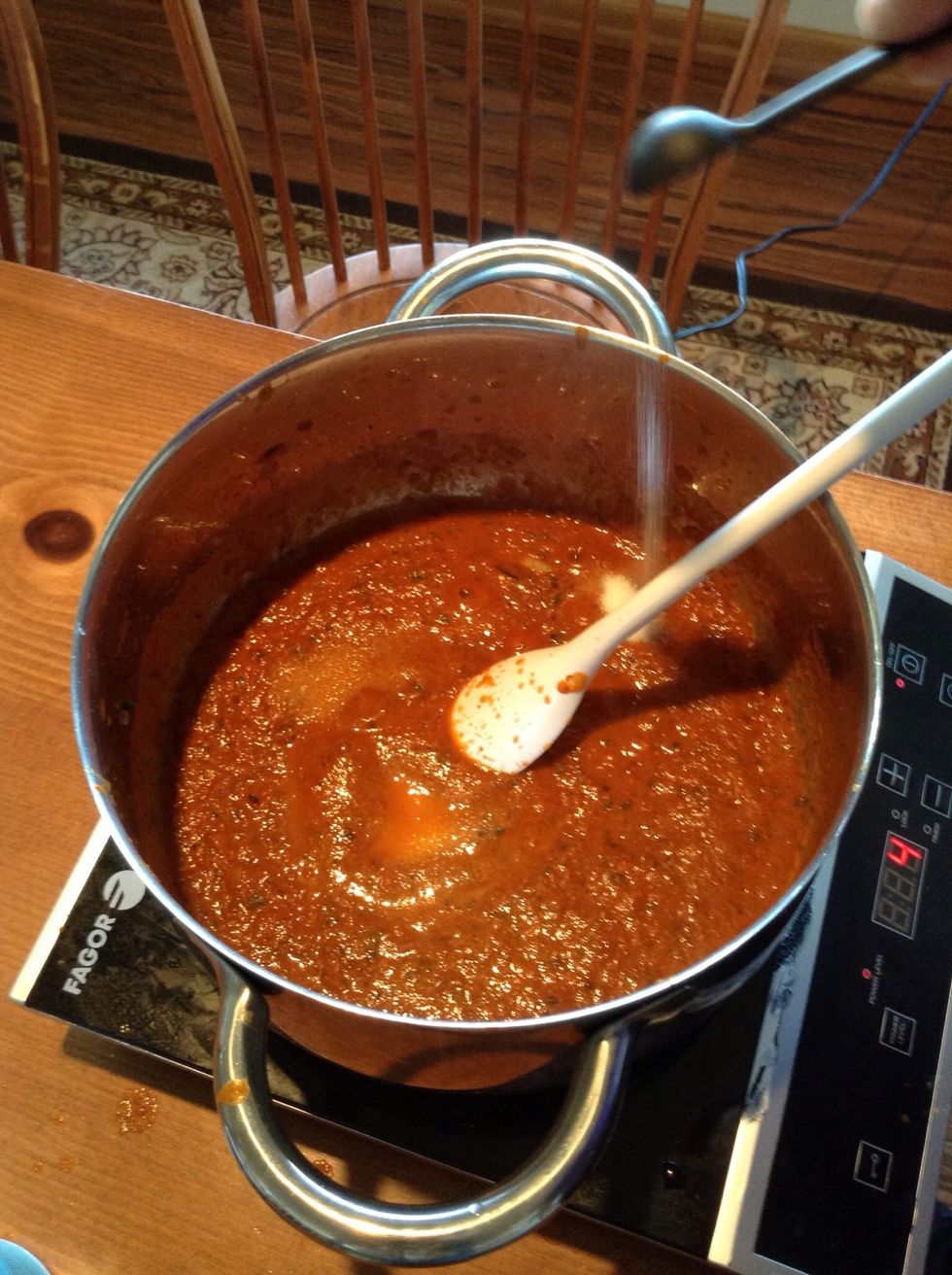 Stir salt and pepper into sauce.