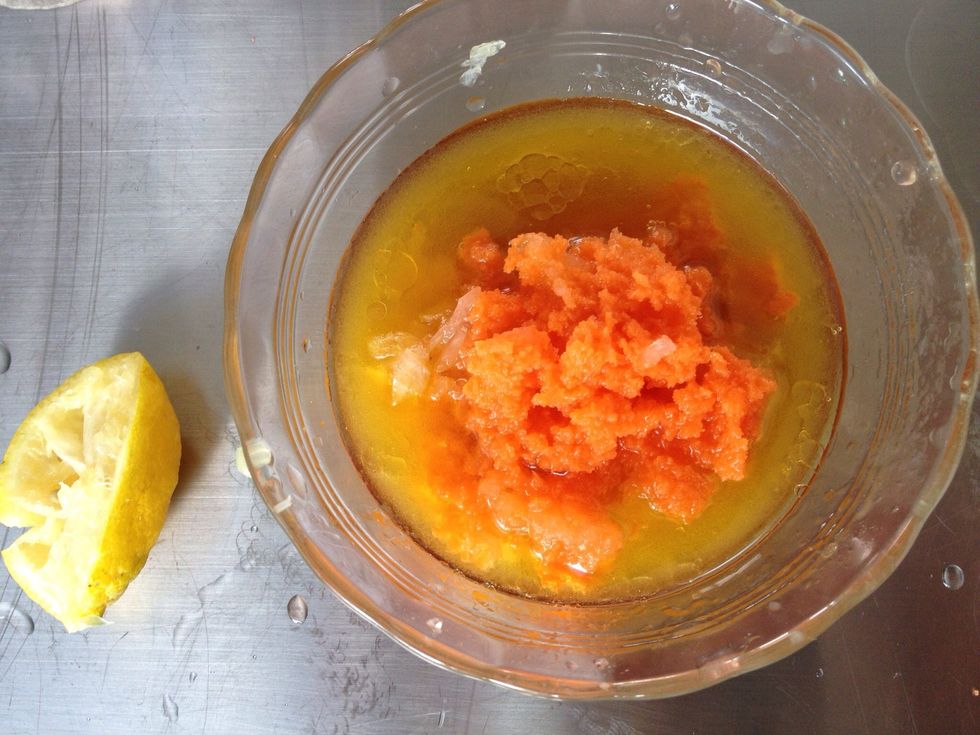 Stir salt in wine vinegar, add olive oil and grated carrot to make dressing.