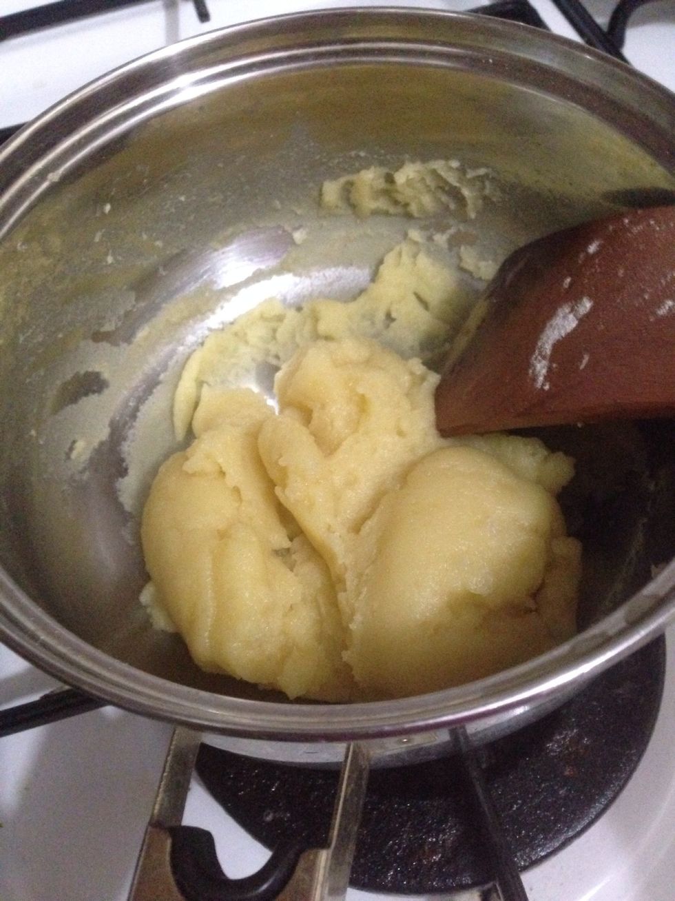 Stir stir stir until the dough looks like thick smooth ball like this. If u already reach this consistency, keep stirring for about 1-2 minutes. Then remove the heat