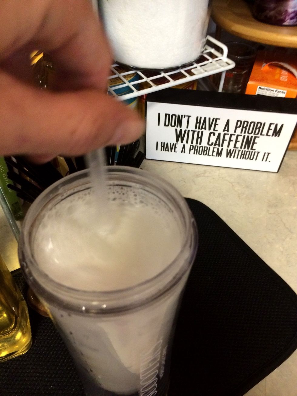 Stir syrup in well with soda and cream