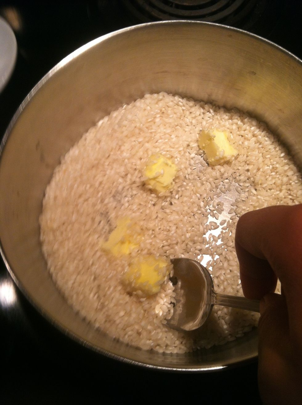 Stir the butter around breaking it into pieces to help it melt.