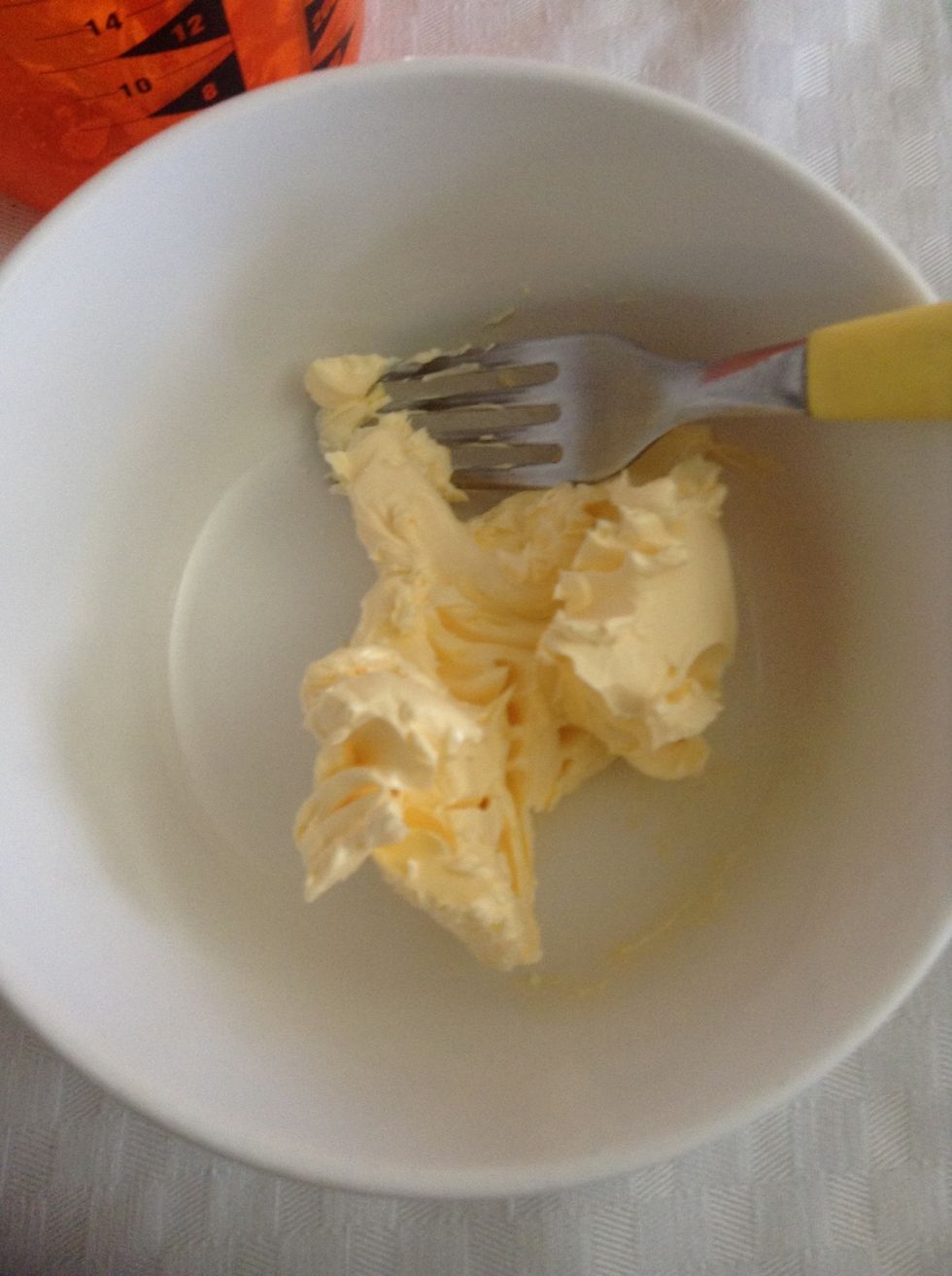 Stir the butter until it is soft