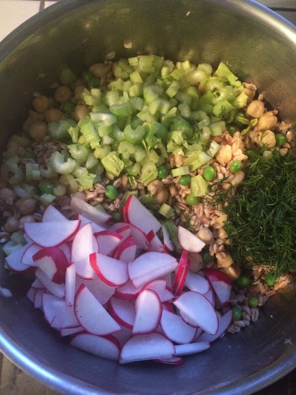Stir the celery, radishes, and dill into the pot.