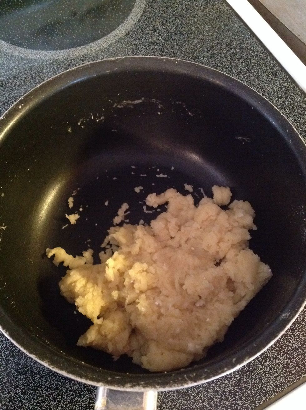 Stir the ingredients until the mixture forms a ball.