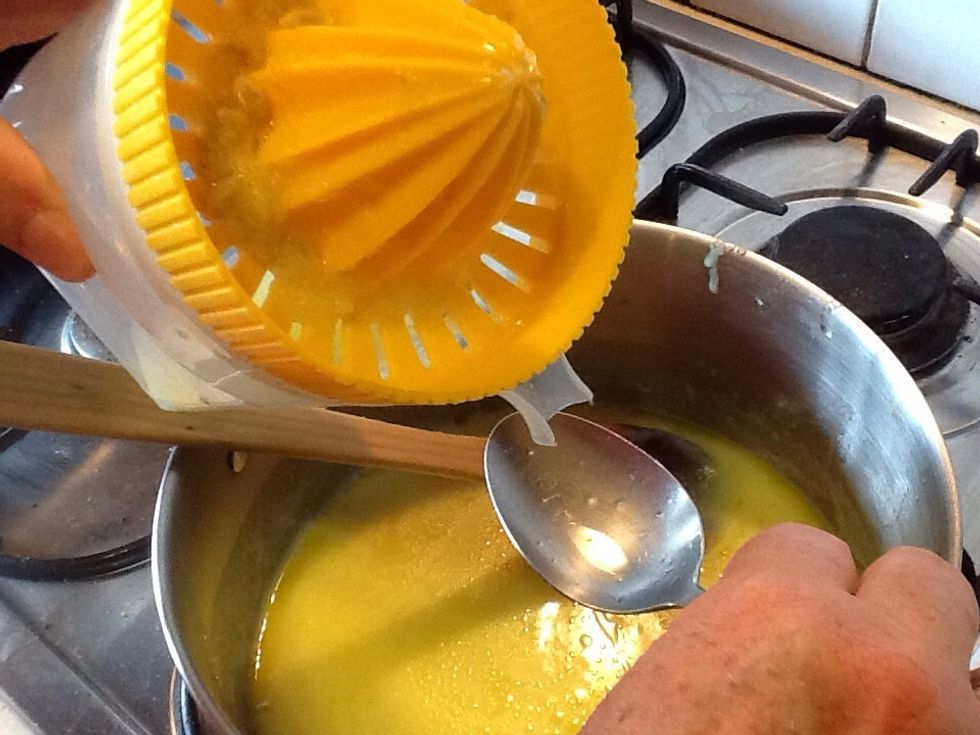 Stir the lemon juice into the condensed milk mixture.