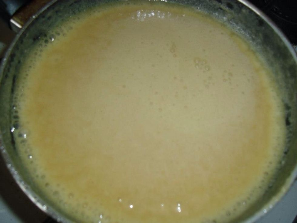 Stir the mixture until the sugar has dissolved.