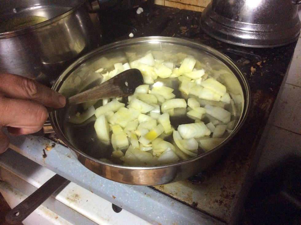 Stir the onion and garlic for a few minutes to soften