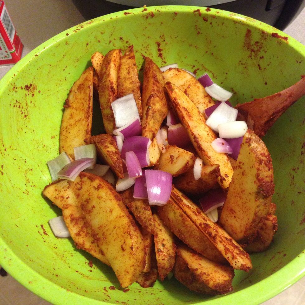Stir the potatoes. I added in onions to the initial mixture but they cook much faster. I would add them in about 20 mins into cooking.