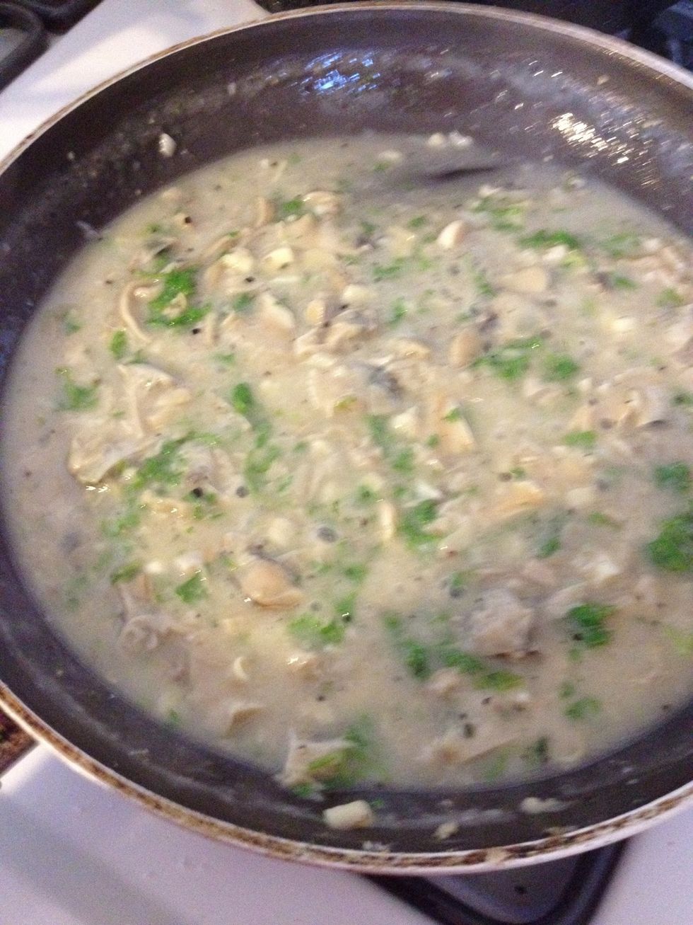 Stir the sauce as it thickens. I add a little bit of cooking wine (or any white wine will do) as necessary to get the right consistency. You don't want it too thick or too thin.