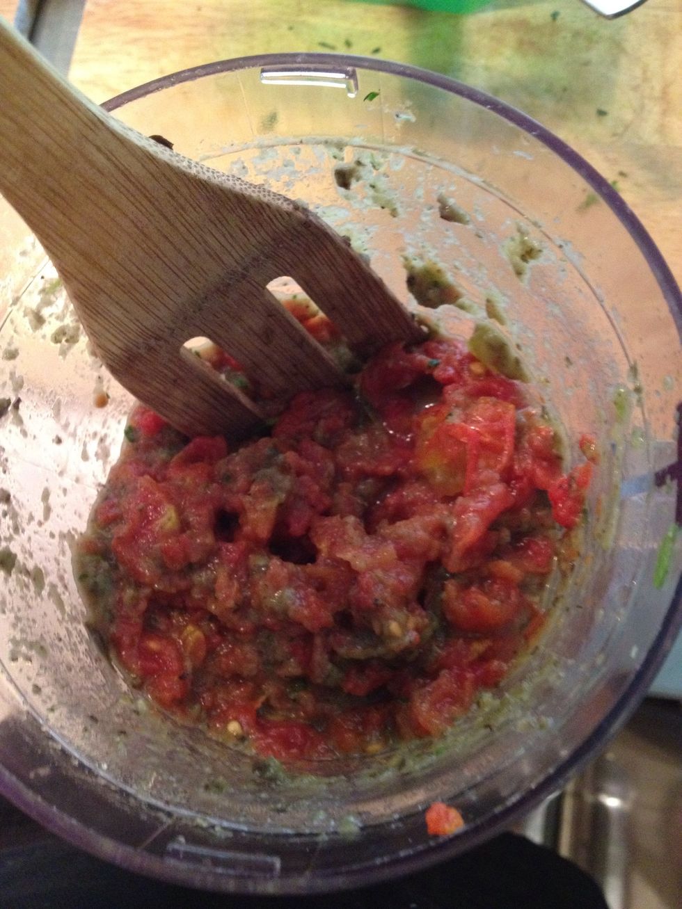 stir the tomatoes into the mixture before you pulse