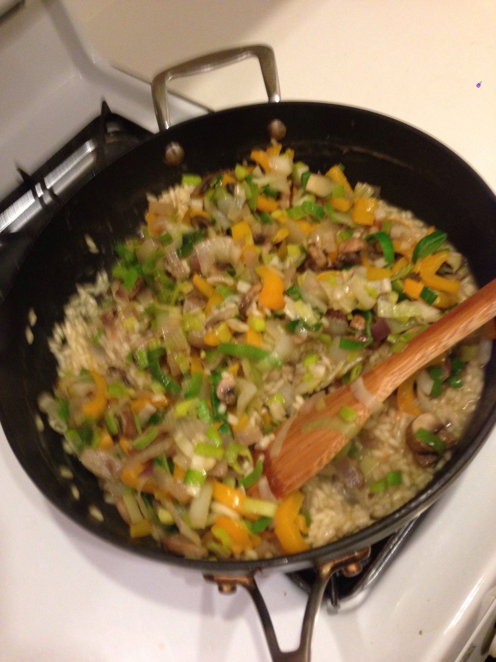 Stir the veggies into the risotto.