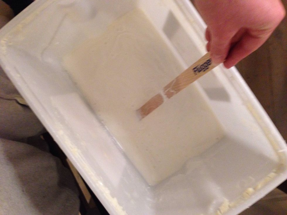 Stir the wallpaper glue.