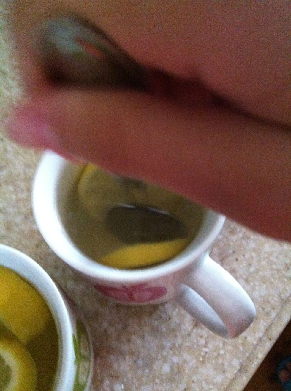 Stir the water and lemon and honey