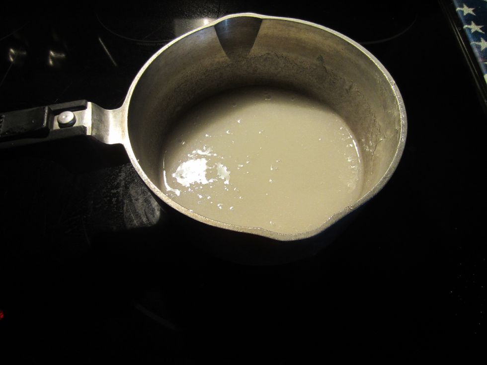 Stir together and cook a on a stove at medium high heat.