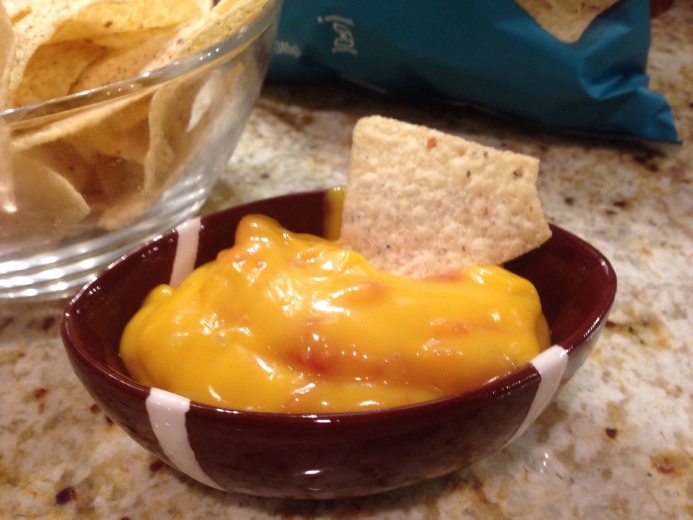 Stir together the can of soup and 1/2 can of Rotel drained. Then heat in microwave.