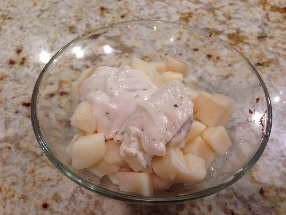Stir together the dressing, mayo, and potatoes.  Use 1 can potatoes, 1 tbls mayo, 3 tbls dressing.  This version is using Ranch dressing.