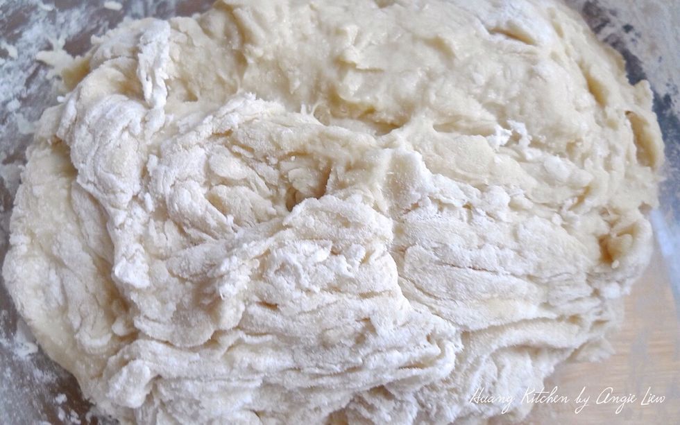 Stir until dough begins to pull together into a ball.