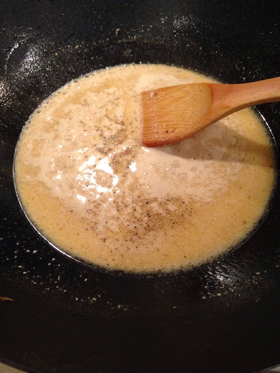 Stir until mixture blends and begins to thicken. Add salt and pepper.