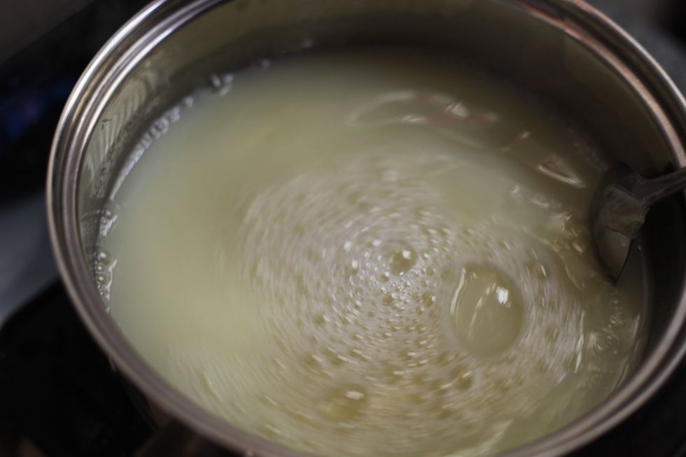 Stir until the sugar is melted. We don't need to boil the milk. A nice low-medium heat is fine.