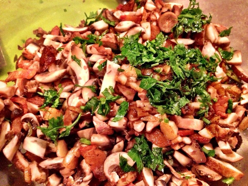 Stir up the criminis, garlic, capers, and flat leaf parsley in the baking dish. Toss in a 425* preheated oven & bake for 20-25 mins. Look for a nice sauce forming in the bottom of the baking dish.