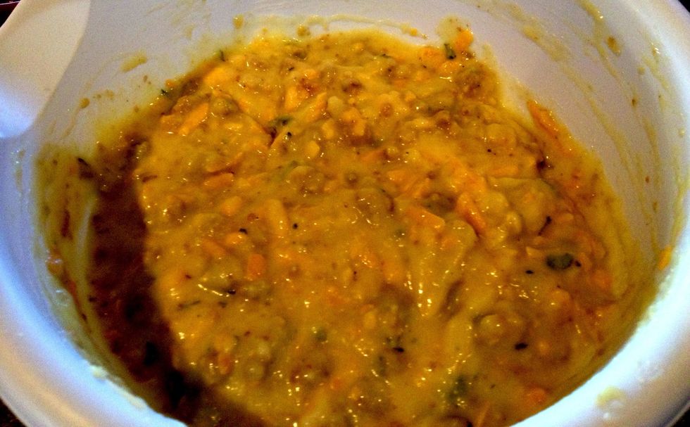 Stir well! Mixture should be thick enough to hold shape when you drop spoonsful into the pan. Remember that bacon grease? Yes, you'll be frying these delicious potato cakes in that!