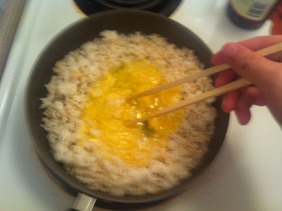 Stir with chopstick in circle motion on medium heat