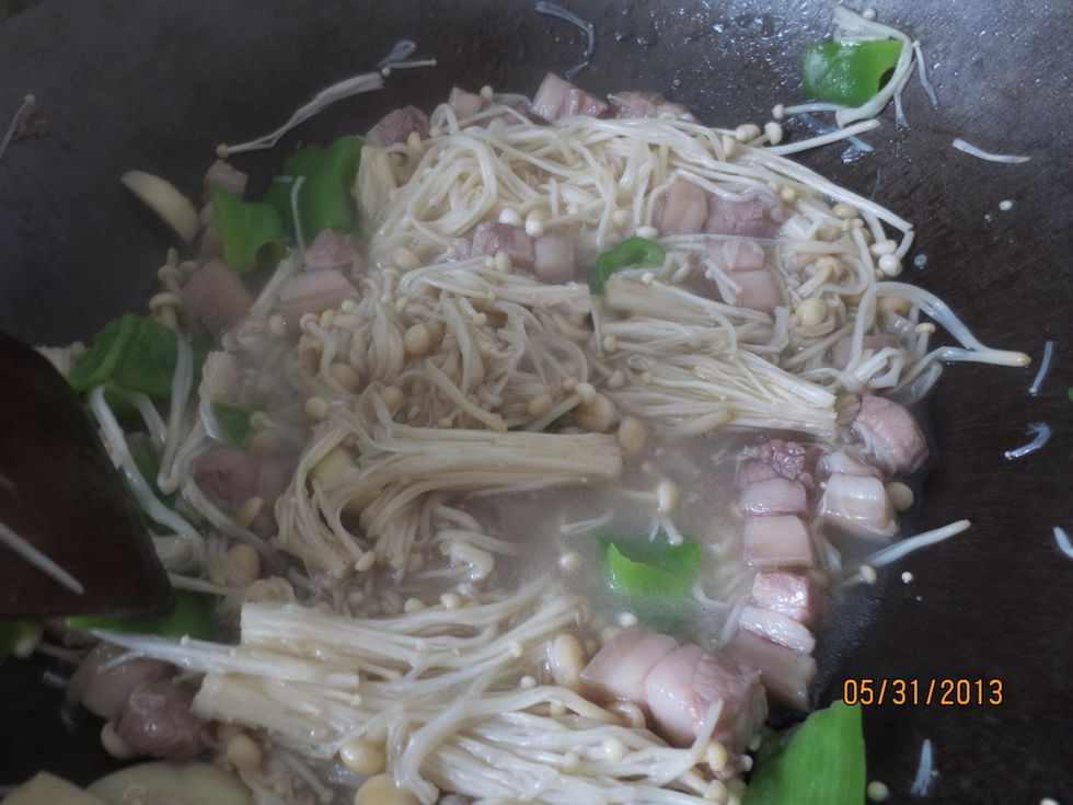 Stirfry, the water should cook out of the mushrooms