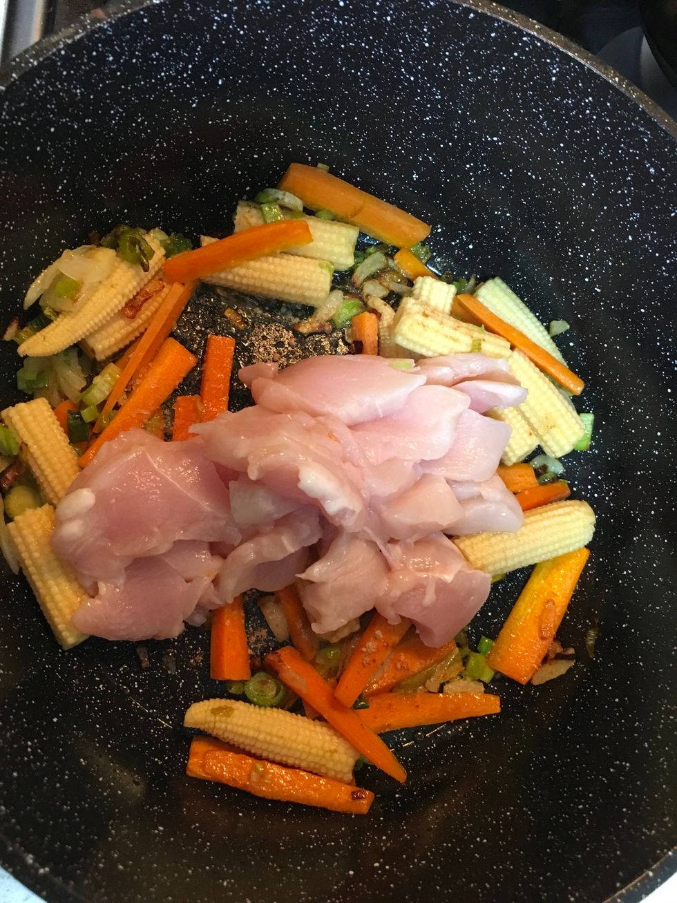 Stirr well till all vegetables combined, and after 5 minutes add chicken dice into it