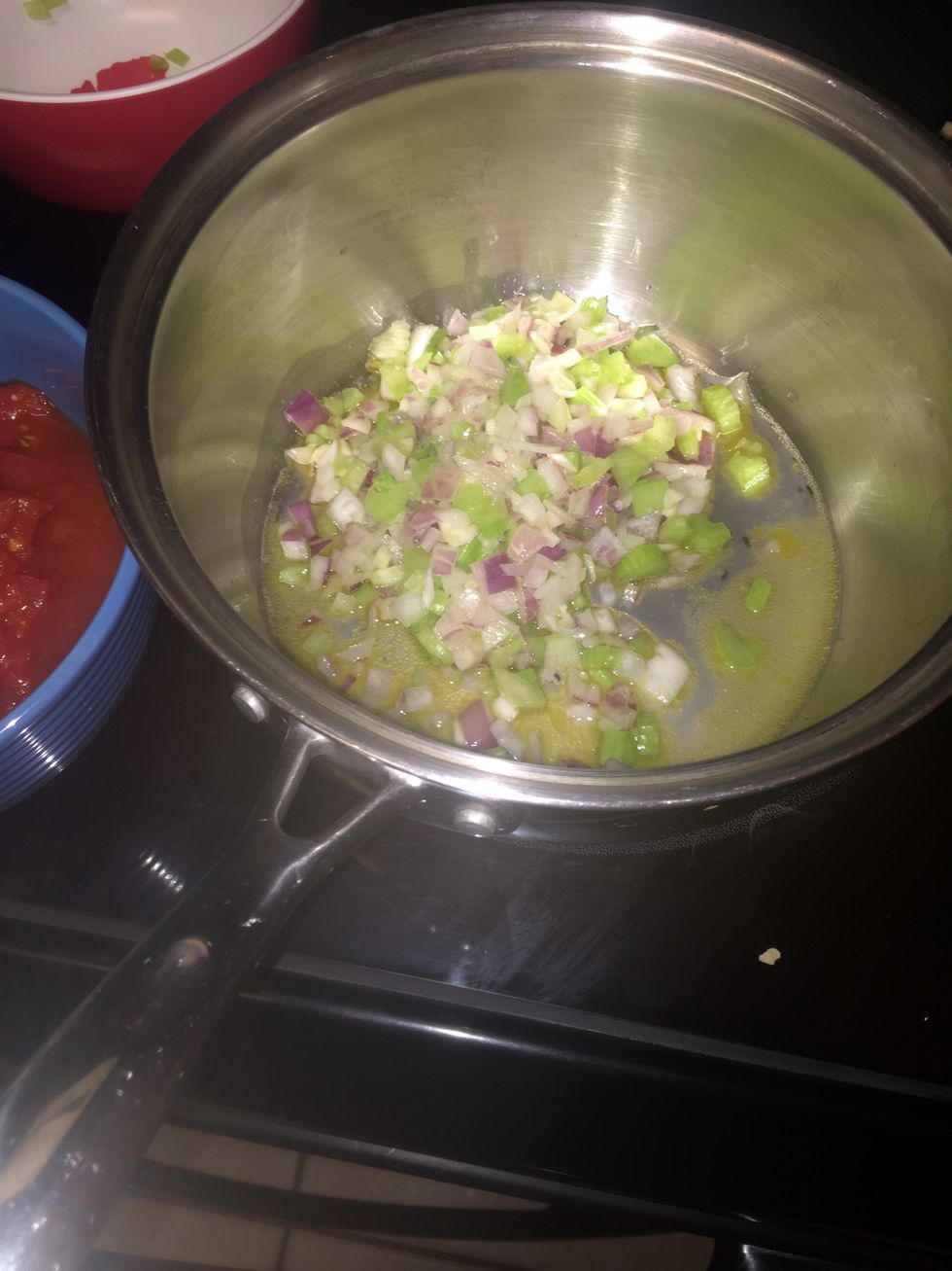 Stirring occasionally for five minutes until softened