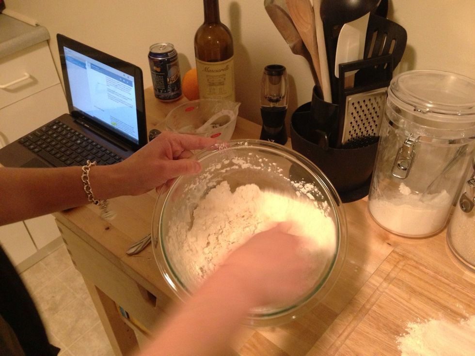 Stirring the ingredients together.