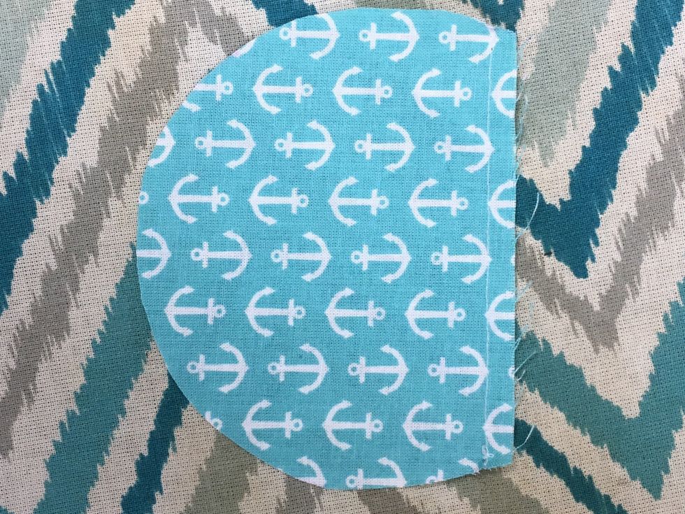 Stitch 1/4" along the flat edge of the half circle. This is a guideline stitch.