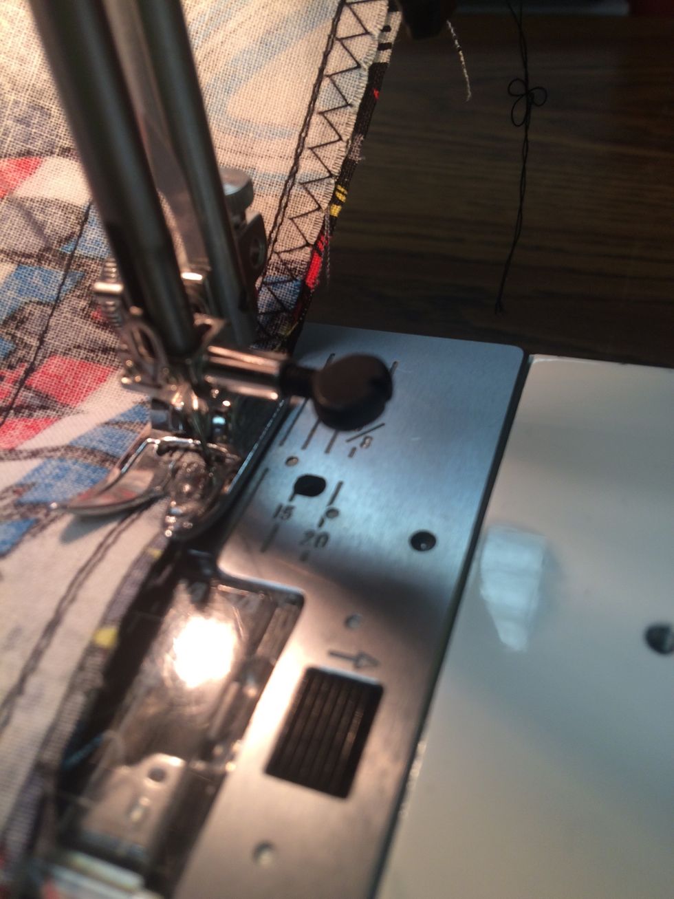 Stitch a zigzag stitch in between the edge and the stitch to reinforce the bottom of the bag