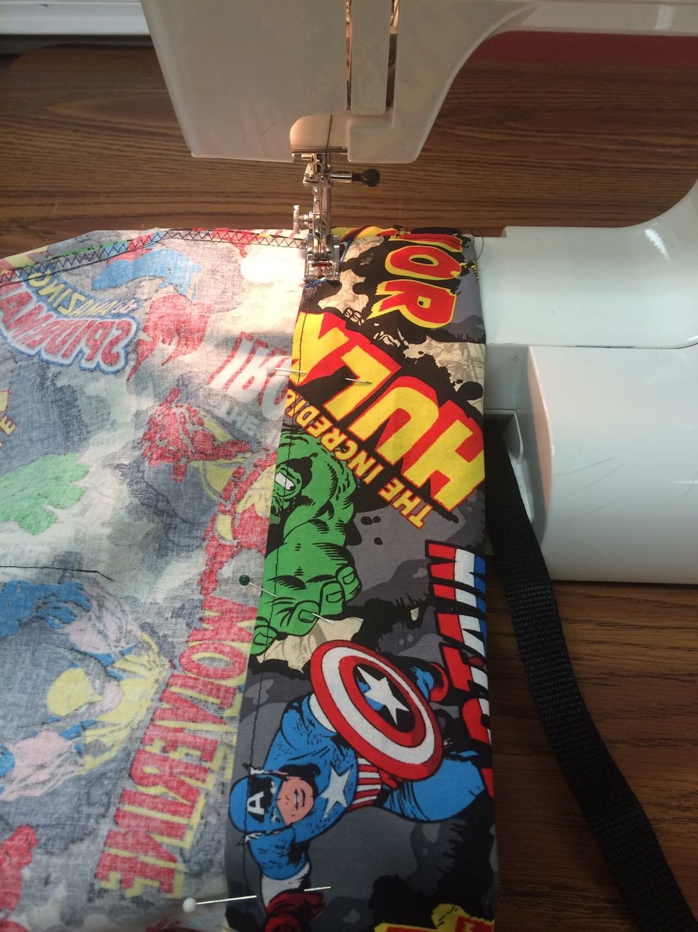 Stitch along the previous stitch line all around the top circle. Make sure you don't stitch the webbing strap. You are sewing under the strap!!!!