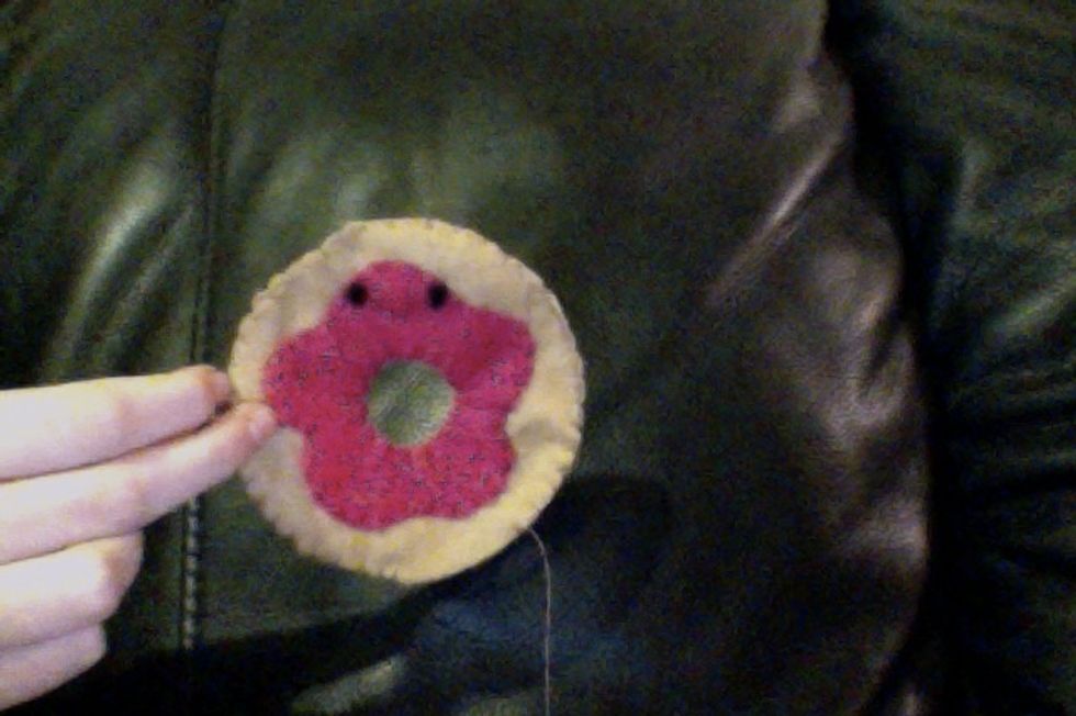 Stitch around the outer edge with tan thread, leaving an opening for stuffing.