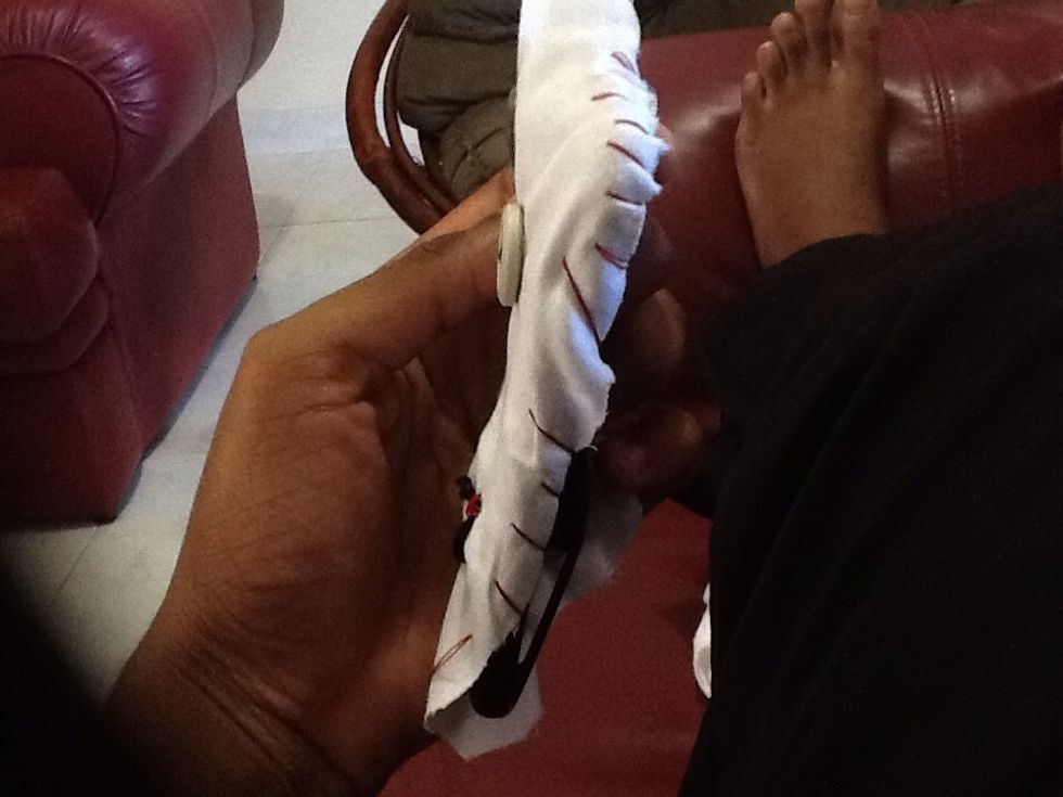 Stitch around the sides , .. If u can find a better way to get the fabric onto the case , u should do it