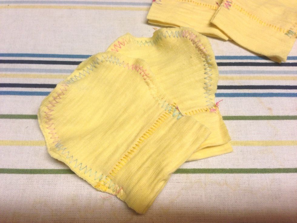 Stitch the mitten closed making sure you don't sew all the way to the bottom of the hem.