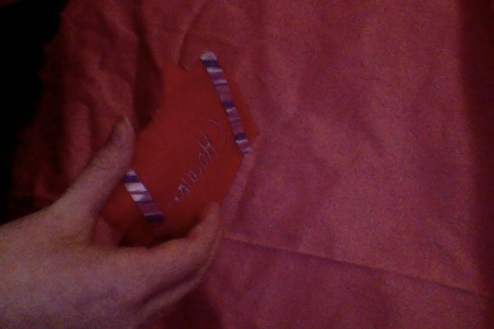 Stitch you two pieces together along one side, the bottom, and 2/3 up the other side. leave the top unstitched.