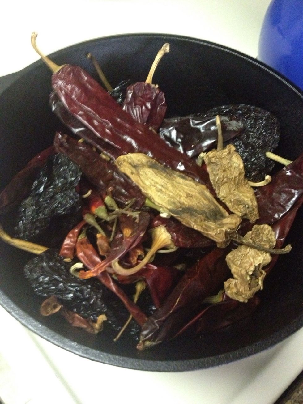 Stock up on dried peppers at a Mexican grocery.  Go for freshest looking dried peppers. High turnover= fresh peppers.  I choose a little of every variety, remember smaller peppers tend to be hotter.