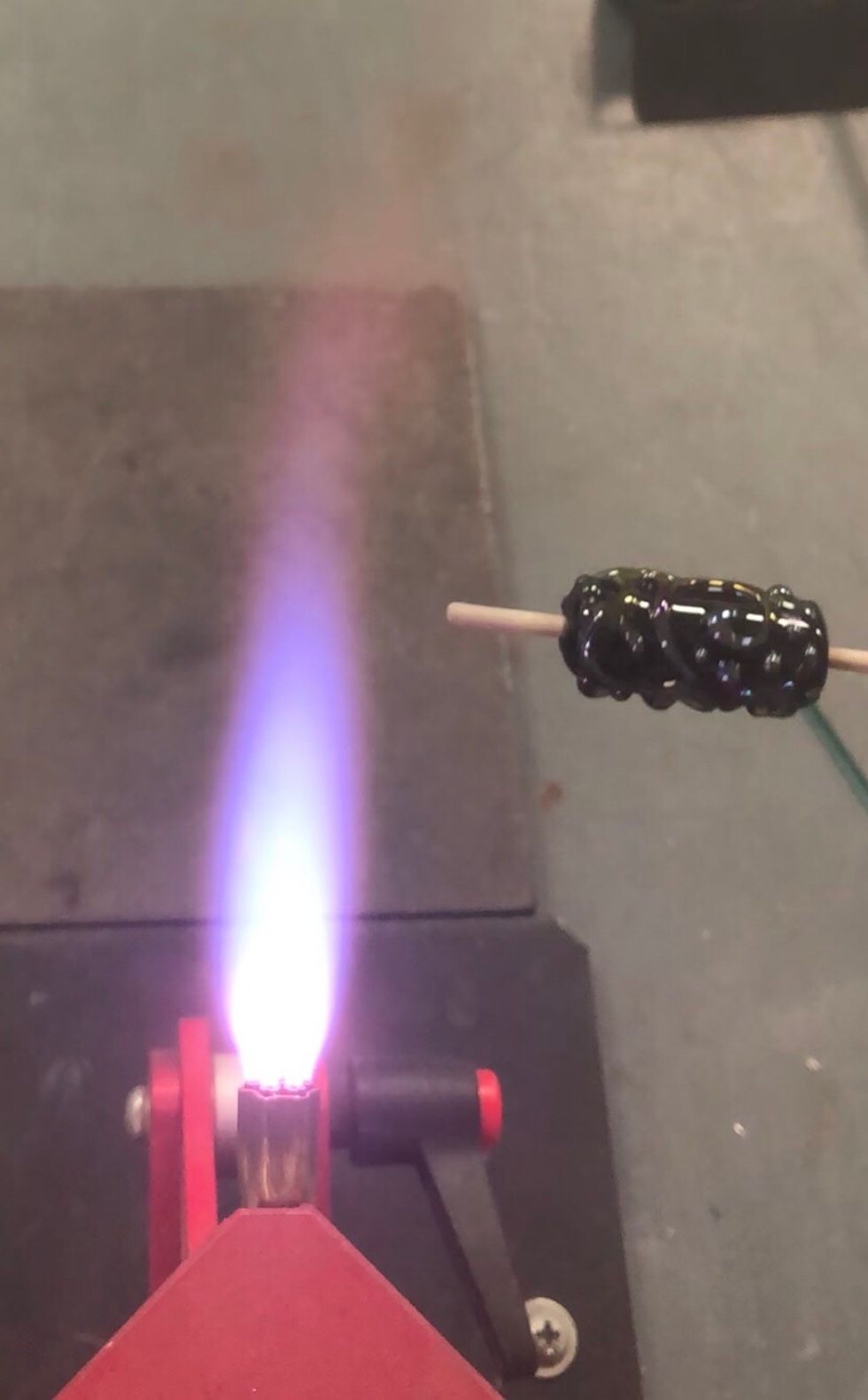 Stop and inspect the bead. In addition to determining if you want more reduction, this pause also gives the surface of the bead a chance to cool.