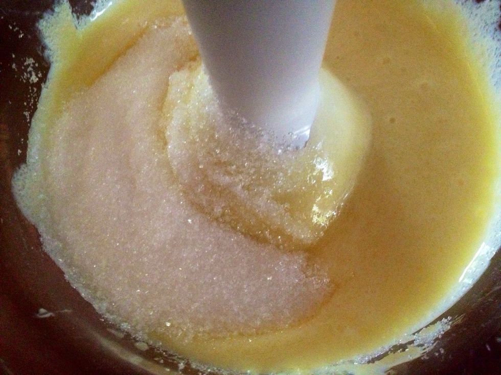 Stop beating momentarily - have a sip of your favorite drink - then add 1 cup granulated sugar and 1 cup light brown sugar,