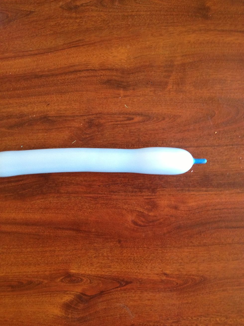 Stop pumping and tie the end of your balloon making sure that you have left 1INCH of space remaining at the tip of your balloon.