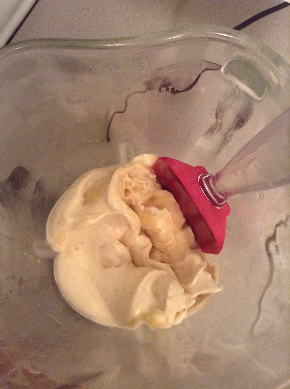 Stop the blender and take a spatula and scrape the sides making sure the solid chunks of unblended banana move to the bottom to get blended... (The banana slides off the spatula which is great)